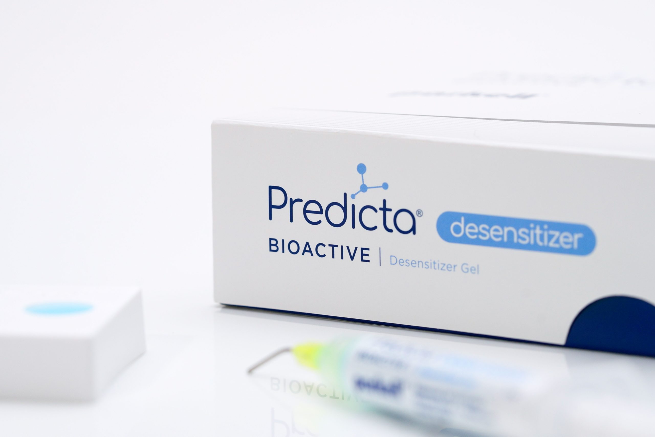 Predicta Bioactive Desensitizer kit shown with a syringe, and a mixing well